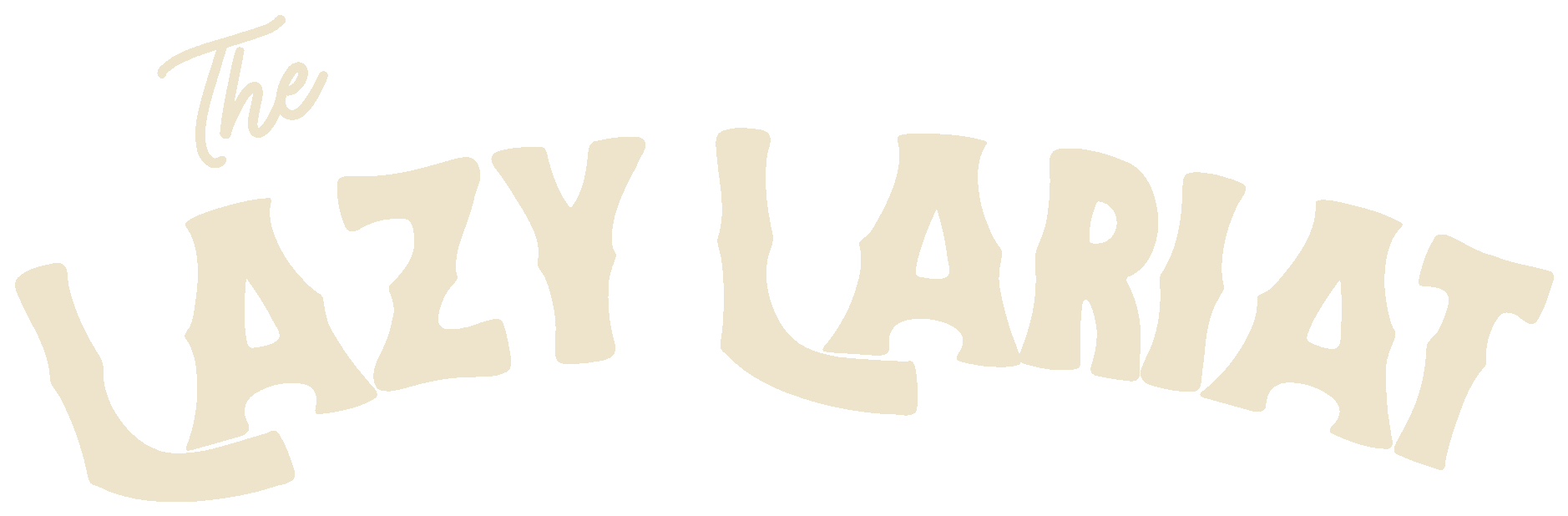 The Lazy Lariat wordmark in cream, over a twilight cabin in the pines, Broken Bow Oklahoma
