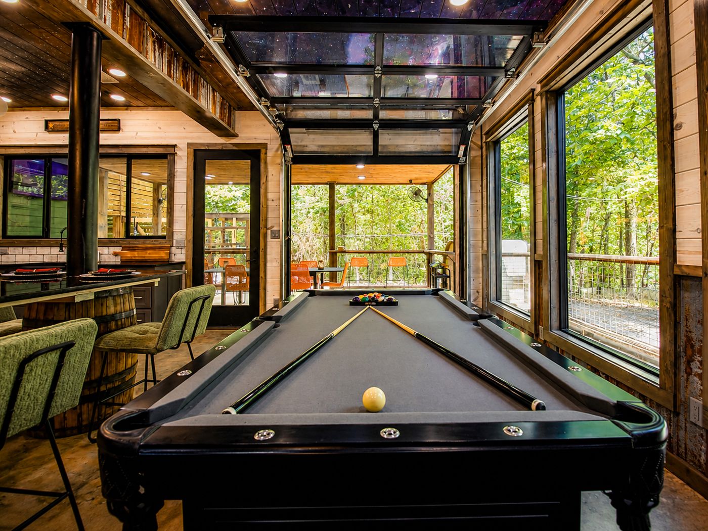 Game room with a pool table in a Yellowwood Atelier-designed short-term rental