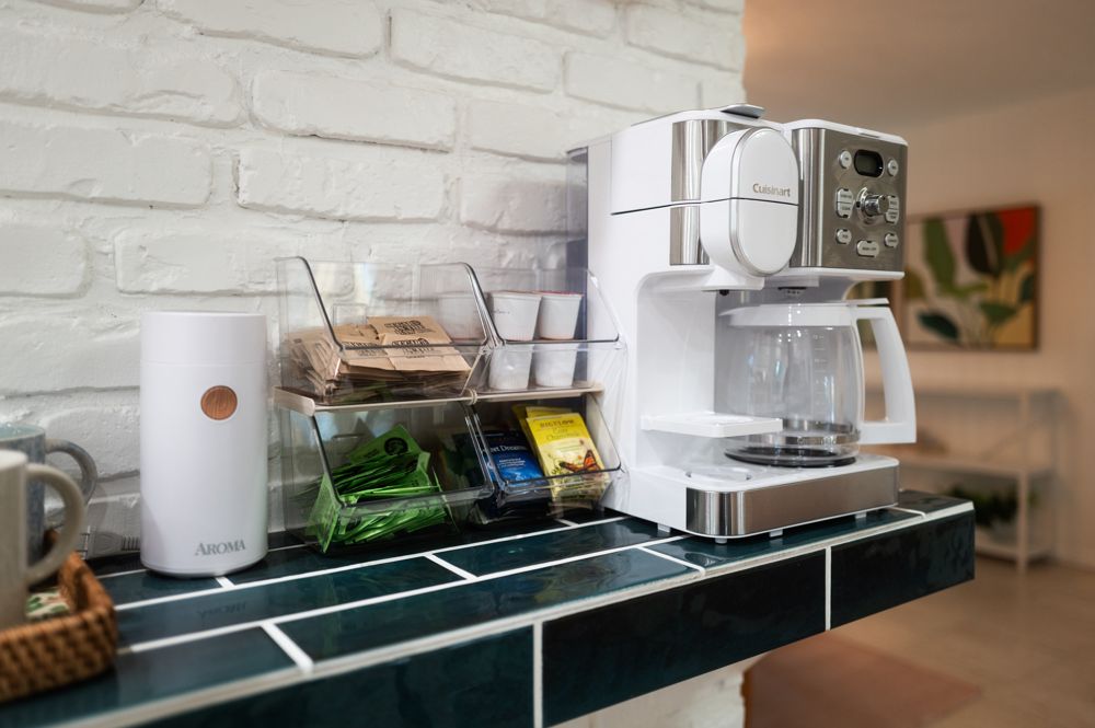 Coffee and tea station stocked for short-term rental guests