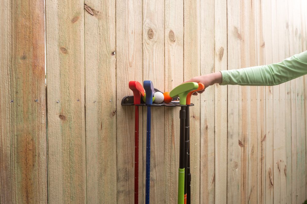 Backyard mini-golf setup at a short-term rental